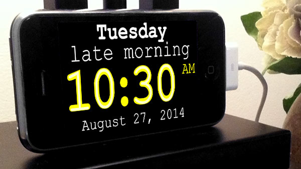 iPhone web app: yellow large-print digital clock (10:30AM with description 'late morning')